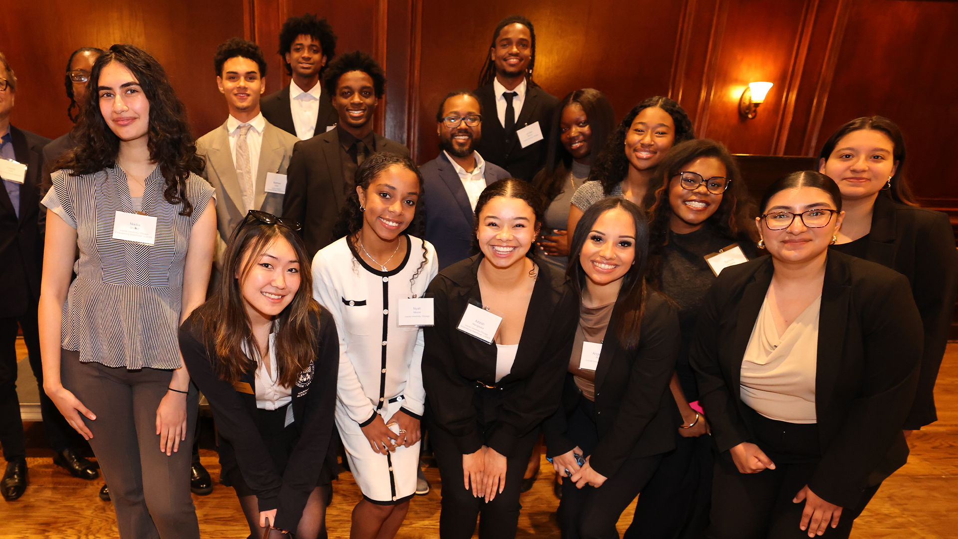 Loyola students pose at the Chicago City Club. Loyola students pose at the Chicago City Club.